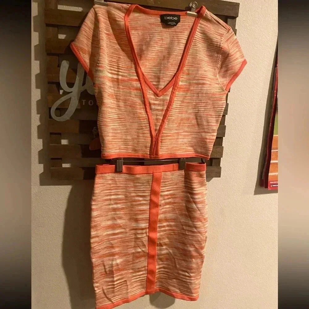 Bebe two piece cropped orange top and skirt set size XS‎